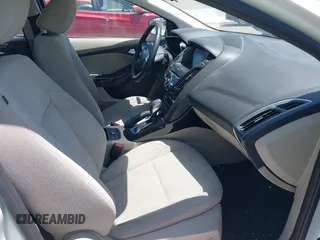 2014 Ford Focus Electric z VIN 1FADP3R42EL393337, wystawiony jako IAAI lot #42365836 z przebiegiem 14 593 mil mil oraz . Historia ofert i sprzedaży dostępna na DreamBid. Obrazek 5.
