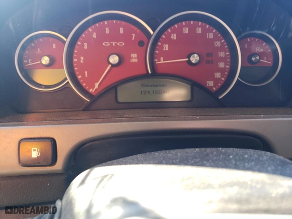 2004 Pontiac GTO with VIN 6G2VX12G04L200129, listed as a Copart auction lot 71822564 with 124,155 mi miles and Salvage Title. Bid and sale history available at carsss.com. Image 9.