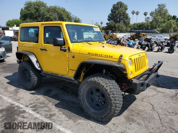 2015 Jeep Wrangler Rubicon Hard Rock with VIN 1C4BJWCG6FL568665, listed as a Copart auction lot 60282155 with 107,773 mi miles and Salvage title. Bid and sale history available at DreamBid. Image 4.