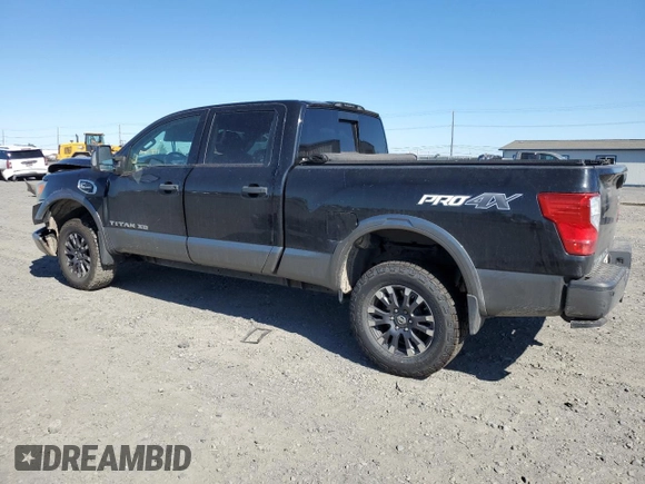 2017 Nissan Titan Pro-4X z VIN 1N6BA1F42HN530830, wystawiony jako Copart lot #63860384 z przebiegiem 317 812 mil mil oraz Szkoda całkowita • Salvage title. Historia ofert i sprzedaży dostępna na DreamBid. Obrazek 2.