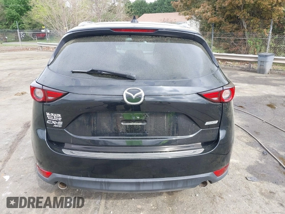 2018 Mazda CX-5 Grand Touring with VIN JM3KFBDM1J0358197, listed as a IAAI auction lot 41967940 with 148,119 mi miles and . Bid and sale history available at DreamBid. Image 16.