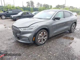 2023 Ford Mustang Mach-E Premium with VIN 3FMTK3SU4PMA76915, listed as a IAAI auction lot 42350153 with 3,957 mi miles and . Bid and sale history available at DreamBid. Image 2.
