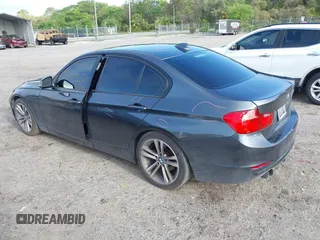 2014 BMW 3 Series 328i with VIN WBA3C1C52EK116956, listed as a IAAI auction lot 41907691 with 125,856 mi miles. Bid and sale history available at carsss.com. Image 3.