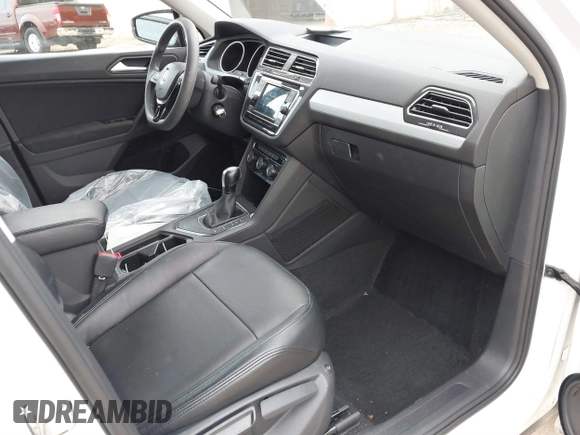 2021 Volkswagen Tiguan S with VIN 3VV1B7AX5MM086946, listed as a IAAI auction lot 41763747 with 41,713 mi miles and . Bid and sale history available at DreamBid. Image 5.