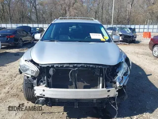 2013 Infiniti JX35 with VIN 5N1AL0MM3DC336945, listed as a IAAI auction lot 41858705 with 114,784 mi miles. Bid and sale history available at carsss.com. Image 13.