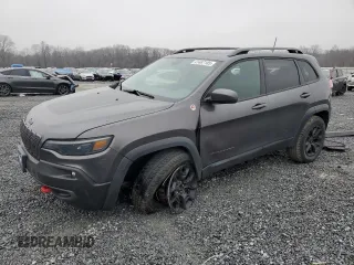 2020 Jeep Cherokee Trailhawk z VIN 1C4PJMBN5LD541036, wystawiony jako Copart lot #41487185 z przebiegiem 27 267 mil mil oraz Szkoda całkowita • Salvage title. Historia ofert i sprzedaży dostępna na DreamBid. Obrazek 1.