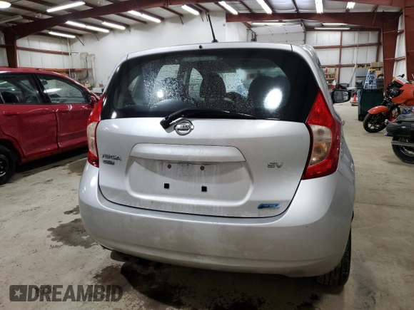 2015 Nissan Note S with VIN 3N1CE2CP7FL399569, listed as a Copart auction lot 58712605 with 131,049 mi miles and Salvage title. Bid and sale history available at DreamBid. Image 6.