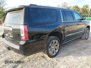 2019 GMC Yukon XL Denali with VIN 1GKS2HKJ2KR226275, listed as a IAAI auction lot 41552828 with 82,069 mi miles. Bid and sale history available at carsss.com. Image 4.
