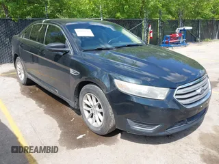 2014 Ford Taurus SE z VIN 1FAHP2D85EG145811, wystawiony jako IAAI lot #42202446 z przebiegiem 214 718 mil mil oraz . Historia ofert i sprzedaży dostępna na DreamBid. Obrazek 1.