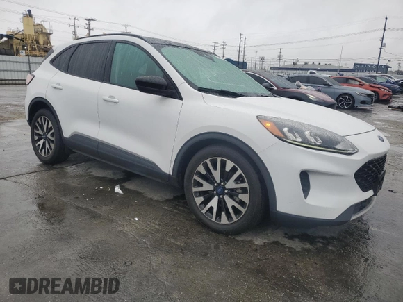 2020 Ford Escape SE Sport Hybrid with VIN 1FMCU0BZ4LUC32901, listed as a Copart auction lot 42052085 with 77,689 mi miles and Salvage Title. Bid and sale history available at DreamBid. Image 4.