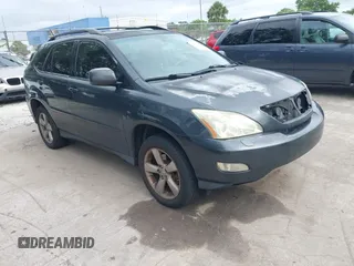 2007 Lexus RX 350 z VIN JTJGK31U670008008, wystawiony jako IAAI lot #42429197 z przebiegiem 163 557 mil mil oraz . Historia ofert i sprzedaży dostępna na DreamBid. Obrazek 1.