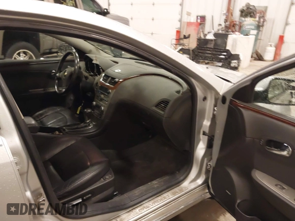 2012 Chevrolet Malibu LTZ with VIN 1G1ZG5E79CF205316, listed as a IAAI auction lot 41936446 with 133,578 mi miles and . Bid and sale history available at DreamBid. Image 5.