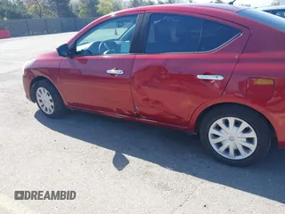 2016 Nissan Versa S with VIN 3N1CN7AP6GL901795, listed as a IAAI auction lot 42019769 with 121,561 mi miles. Bid and sale history available at carsss.com. Image 6.