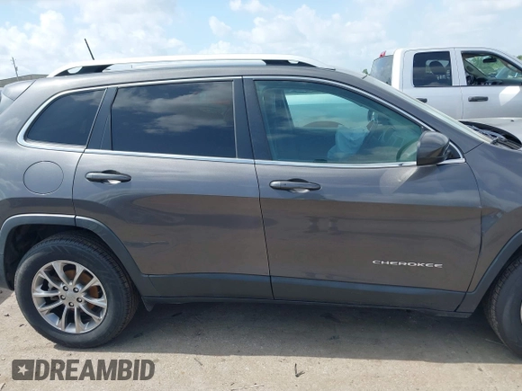 2019 Jeep Cherokee Latitude Plus with VIN 1C4PJLLB1KD172060, listed as a IAAI auction lot 42446369 with 91,222 mi miles and . Bid and sale history available at DreamBid. Image 13.