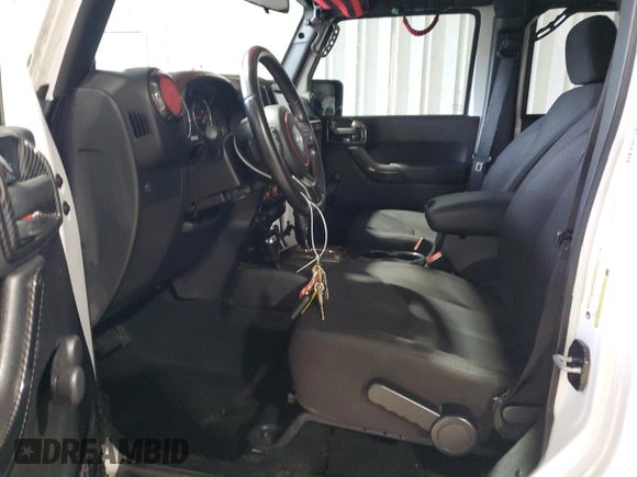 2014 Jeep Wrangler Unlimited Sport with VIN 1C4BJWDG4EL125251, listed as a Copart auction lot 51092675 with 76,867 mi miles and Clean Title. Bid and sale history available at carsss.com. Image 7.