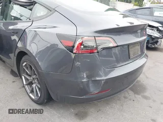 2023 Tesla Model 3 with VIN 5YJ3E1EA4PF705949, listed as a IAAI auction lot 42336682 with 88,056 mi miles and . Bid and sale history available at DreamBid. Image 19.
