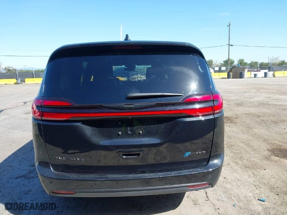2023 Chrysler Pacifica Hybrid Limited with VIN 2C4RC1S75PR562880, listed as a IAAI auction lot 41966611 with 10,867 mi miles. Bid and sale history available at carsss.com. Image 16.