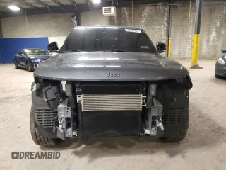 2021 Jeep Grand Cherokee Overland with VIN 1C4RJKDG3M8188009, listed as a Copart auction lot 65584584 with 39,438 mi miles and Salvage title. Bid and sale history available at DreamBid. Image 5.