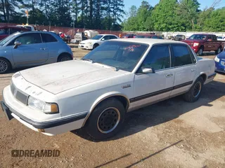 1992 Oldsmobile Cutlass Ciera with VIN 1G3AL54N4N6417365, listed as a IAAI auction lot 42074800 with 306,884 mi miles and . Bid and sale history available at DreamBid. Image 2.