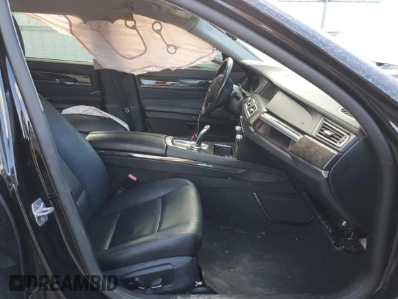 2015 BMW 7 Series 740Li with VIN WBAYE4C58FD138919, listed as a Copart auction lot 69409074 with 145,549 mi miles and Salvage Title. Bid and sale history available at DreamBid. Image 7.