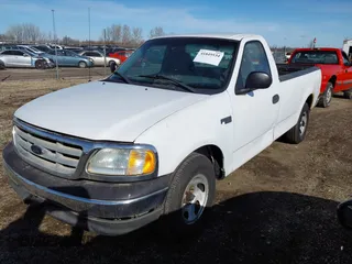2002 Ford F-150 XL with VIN 3FTRF17232MA23677, listed as a IAAI auction lot 41849534 with 1 mi miles. Bid and sale history available at carsss.com. Image 2.
