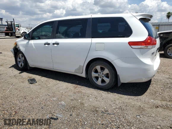2014 Toyota Sienna L with VIN 5TDZK3DCXES463632, listed as a Copart auction lot 69957284 with 206,250 mi miles and Salvage Title. Bid and sale history available at carsss.com. Image 2.