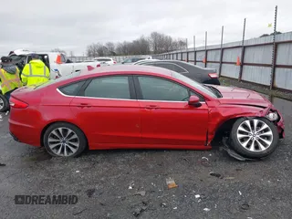 2020 Ford Fusion SE z VIN 3FA6P0T97LR234873, wystawiony jako IAAI lot #41510333 z przebiegiem 65 243 mil mil oraz . Historia ofert i sprzedaży dostępna na DreamBid. Obrazek 13.