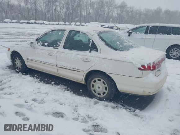 1996 Mercury Mystique z VIN 1MELM653XTK605481, wystawiony jako IAAI lot #41543215 z przebiegiem 120 988 mil mil oraz . Historia ofert i sprzedaży dostępna na DreamBid. Obrazek 3.