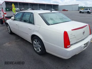 2007 Cadillac DTS Luxury I z VIN 1G6KD57Y67U123765, wystawiony jako IAAI lot #42495242 z przebiegiem 56 193 mil mil oraz . Historia ofert i sprzedaży dostępna na DreamBid. Obrazek 3.