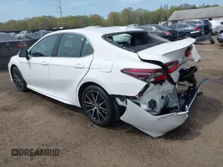 2023 Toyota Camry SE with VIN 4T1G11AK7PU771765, listed as a IAAI auction lot 42060929 with 39,407 mi miles and . Bid and sale history available at DreamBid. Image 3.