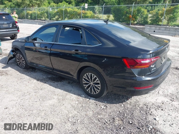 2019 Volkswagen Jetta SEL with VIN 3VWEB7BU7KM193642, listed as a IAAI auction lot 42718572 with 124,633 mi miles and . Bid and sale history available at DreamBid. Image 3.