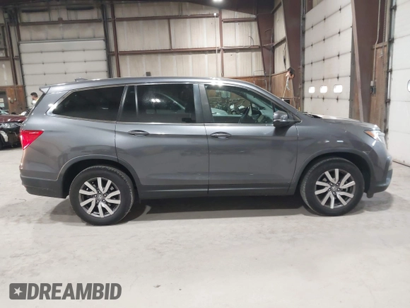 2019 Honda Pilot EX-L with VIN 5FNYF6H51KB099825, listed as a IAAI auction lot 42421688 with 51,370 mi miles and . Bid and sale history available at DreamBid. Image 13.