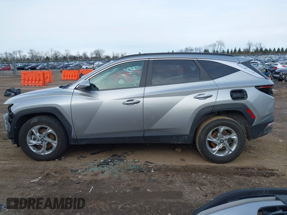 2022 Hyundai Tucson SEL z VIN 5NMJBCAE3NH070531, wystawiony jako IAAI lot #41222494 z przebiegiem 91 358 mil mil oraz . Historia ofert i sprzedaży dostępna na DreamBid. Obrazek 14.