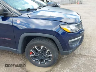 2021 Jeep Compass Trailhawk with VIN 3C4NJDDB0MT590442, listed as a IAAI auction lot 42543530 with 66,669 mi miles and . Bid and sale history available at DreamBid. Image 17.