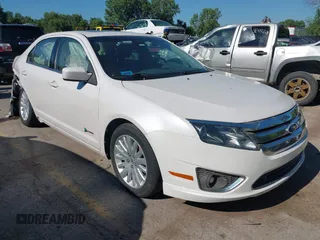 2011 Ford Fusion Hybrid z VIN 3FADP0L35BR178451, wystawiony jako IAAI lot #42672599 z przebiegiem 119 971 mil mil oraz . Historia ofert i sprzedaży dostępna na DreamBid. Obrazek 1.