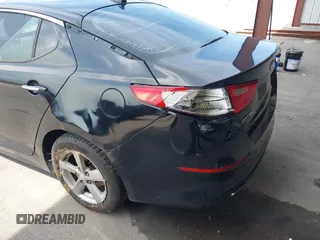 2014 Kia Optima LX z VIN 5XXGM4A77EG322243, wystawiony jako IAAI lot #42334987 z przebiegiem 141 068 mil mil oraz . Historia ofert i sprzedaży dostępna na DreamBid. Obrazek 14.
