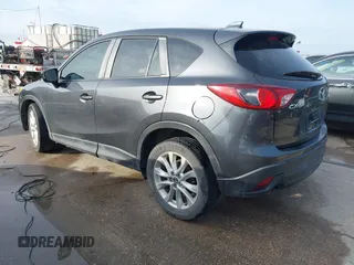 2014 Mazda CX-5 Grand Touring with VIN JM3KE2DY7E0345742, listed as a IAAI auction lot 41864116 with 158,746 mi miles. Bid and sale history available at carsss.com. Image 3.