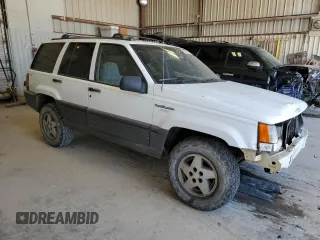 1995 Jeep Grand Cherokee Laredo with VIN 1J4GZ58Y0SC572757, listed as a Copart auction lot 52733375 with 160,588 mi miles and Salvage Title. Bid and sale history available at carsss.com. Image 4.