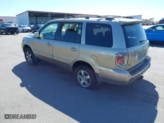 2006 Honda Pilot EX-L with VIN 5FNYF18516B020162, listed as a IAAI auction lot 41799229 with 304,627 mi miles. Bid and sale history available at carsss.com. Image 3.