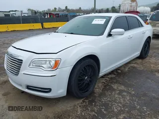 2014 Chrysler 300 with VIN 2C3CCAAG2EH235495, listed as a IAAI auction lot 41787801 with 142,354 mi miles and . Bid and sale history available at DreamBid. Image 17.