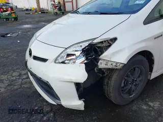 2015 Toyota Prius Four z VIN JTDKN3DU4F1883032, wystawiony jako IAAI lot #41528573 z przebiegiem 104 056 mil mil oraz . Historia ofert i sprzedaży dostępna na DreamBid. Obrazek 6.