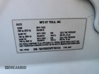 2023 Tesla Model Y Long Range z VIN 7SAYGDEE5PF785124, wystawiony jako Copart lot #56553785 z przebiegiem 31 341 mil mil oraz Szkoda całkowita • Salvage title. Historia ofert i sprzedaży dostępna na DreamBid. Obrazek 12.