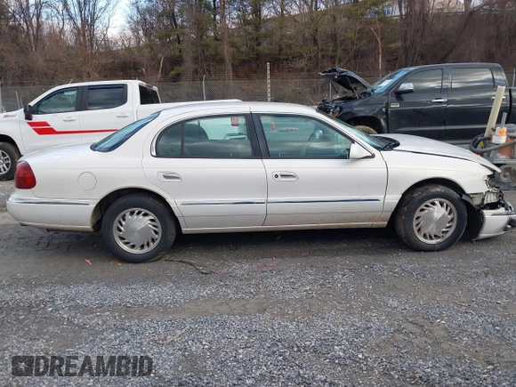 1998 Lincoln Continental with VIN 1LNFM97VXWY619313, listed as a IAAI auction lot 41477852 with 158,973 mi miles. Bid and sale history available at carsss.com. Image 14.