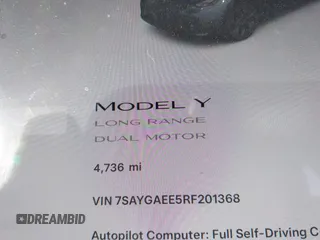 2024 Tesla Model Y Long Range with VIN 7SAYGAEE5RF201368, listed as a IAAI auction lot 41248963 with Not Provided miles and . Bid and sale history available at DreamBid. Image 7.