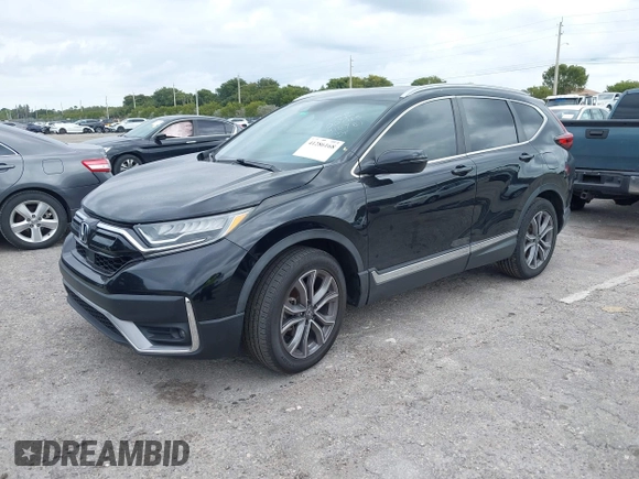 2021 Honda CR-V Touring with VIN 2HKRW1H91MH410751, listed as a IAAI auction lot 41286168 with 56,314 mi miles. Bid and sale history available at carsss.com. Image 17.