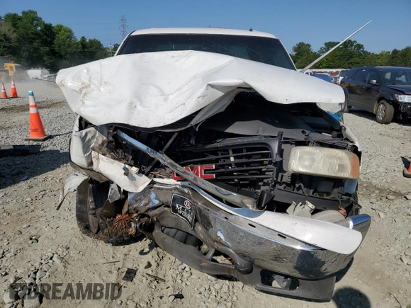 2002 GMC Sierra 1500HD SLE z VIN 1GTGC13U22F117864, wystawiony jako Copart lot #60396074 z przebiegiem Nie podano mil oraz Szkody całkowita. Historia ofert i sprzedaży dostępna na DreamBid. Obrazek 5.