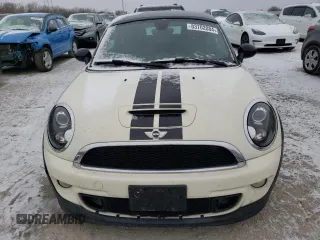 2013 MINI Coupe S z VIN WMWSX3C56DT772517, wystawiony jako Copart lot #83702084 z przebiegiem 106 910 mil mil oraz Tytuł czysty. Historia ofert i sprzedaży dostępna na DreamBid. Obrazek 5.