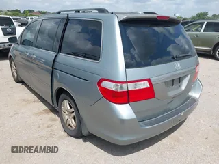 2005 Honda Odyssey EX-L with VIN 5FNRL38735B118506, listed as a IAAI auction lot 42101540 with 159,688 mi miles. Bid and sale history available at carsss.com. Image 3.
