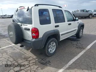 2002 Jeep Liberty Sport with VIN 1J4GL48K92W268896, listed as a IAAI auction lot 41915144 with 102,706 mi miles. Bid and sale history available at carsss.com. Image 4.