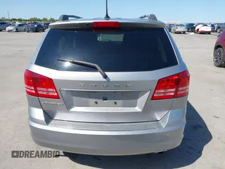 2017 Dodge Journey SE z VIN 3C4PDCAB1HT573511, wystawiony jako IAAI lot #41984865 z przebiegiem 128 721 mil mil oraz . Historia ofert i sprzedaży dostępna na DreamBid. Obrazek 16.